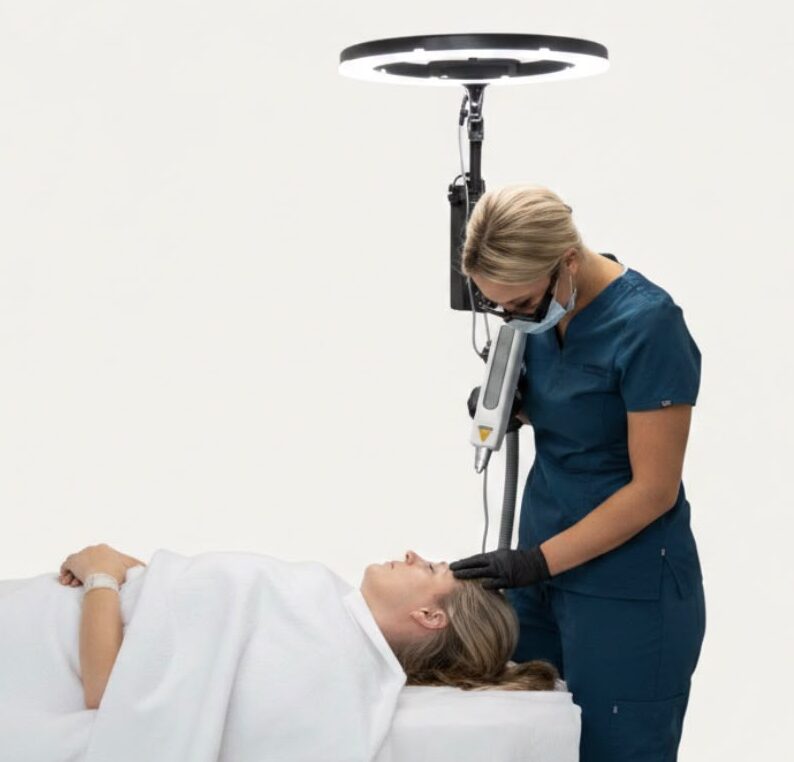 Jade working in a salon laser removal